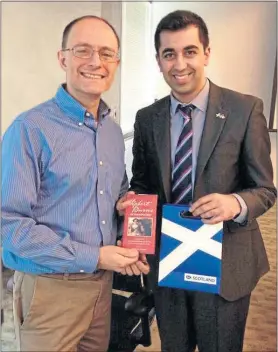  ??  ?? US tycoon Bardia Pezeshki meets minister Humza Yousaf in 2014