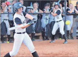  ?? Tommy Romanach / Rome News-Tribune ?? Rockmart’s Emily Maulding swings at an incoming pitch during a Region 7-AA softball game against Pepperell.