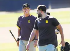  ?? K.C. ALFRED U-T ?? First baseman Eric Hosmer says Padres bench coach and new third base coach Bobby Dickerson “just wants you to be the best you can be.”