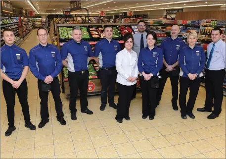  ??  ?? Staff at the revamped Aldi store