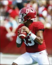  ?? BUTCH DILL — ASSOCIATED PRESS ?? Alabama quarterbac­k Tua Tagovailoa drops back to pass during the first half of Saturday’s game against Arkansas State in Tuscaloosa, Ala.