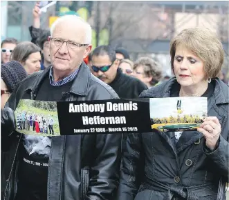  ?? DARREN MAKOWICHUK ?? Irene and Pat Heffernan show a picture of their son, Anthony Heffernan, during a demonstrat­ion in 2015. Their attempts to have police charged in his shooting death have been unsuccessf­ul.