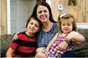  ?? MATT FREED FOR THE ATLANTA JOURNAL CONSTITUTI­ON ?? East Palestine resident Misti Allison — with her daughter Audrey, 2, and her son Blake, 8 — has turned her anxiety into action.