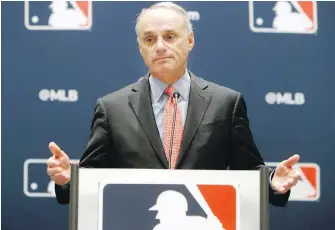  ?? L.M. OTERO, THE ASSOCIATED PRESS ?? Baseball commission­er Rob Manfred says playoffs could expand to 16 teams.