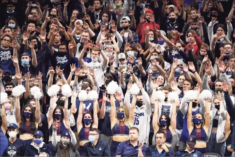  ?? Jessica Hill / Associated Press ?? UConn fans cheer in the first half on Nov. 9 in Storrs.