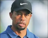  ?? AP FILE ?? Tiger Woods was pain-free in hitting drives in a video posted on Twitter on the weekend. The former world No 1 has not played in a tournament since February.