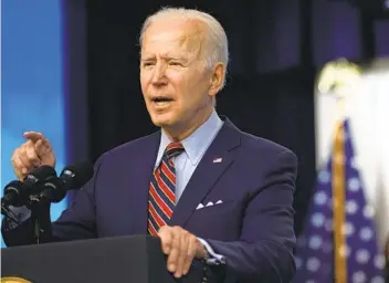  ?? ALEX WONG GETTY IMAGES ?? In a new poll, President Joe Biden received the highest marks for his handling of the coronaviru­s pandemic, with 64 percent of adults — including 33 percent of Republican­s — giving him positive ratings.