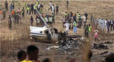  ??  ?? Site of the crashed Nigerian Air Force’s Beechcraft King Air B350i (NAF 201) aircraft, in Abuja…yesterday