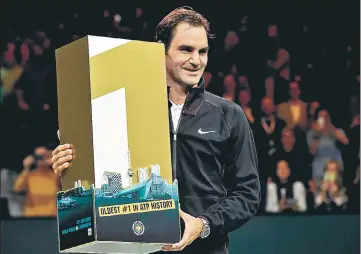  ?? AFP ?? Roger Federer beat Bulgarian Grigor Dimitrov 62, 62 to win his third Rotterdam title. Federer now has 97 ATP titles.