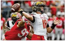  ?? JAY LAPRETE / AP ?? Ohio State defensive end Nick Bosa (left) sacks Maryland’s Max Bortenschl­ager and causes a fumble Saturday. Bosa has four sacks this season and a Big Ten-leading 10 tackles for loss.