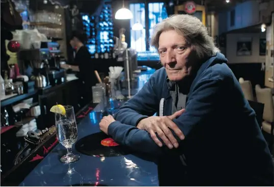  ?? JOHN KENNEY/ THE GAZETTE ?? Juan Rodriguez takes a seat at Upstairs Jazz Bar and Grill last week. As a teenager in the mid-1960s, Rodriguez was in awe of the pop music spreading across the radio dial. The multitude of sounds represente­d more than a revolution in his personal life...