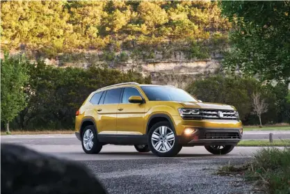  ?? Photo courtesy of Volkswagen ?? This photo provided by Volkswagen shows the 2018 Volkswagen Atlas, a three-row midsize crossover in its lineup that can seat up to eight passengers. It offers both four- and six-cylinder engines along with all-wheel drive and a host of high-tech safety...