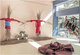  ?? Picture: Supplied ?? Scarecrow installati­on by Thebe Magugu; garment on floor by Siyababa and art in window by AMEN, at Banele Khoza’s BKhz gallery in Braamfonte­in.