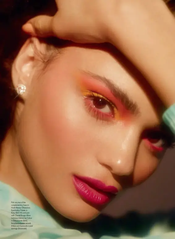  ??  ?? Pick any two of the complement­ary hues in Huda Beauty Obsessions Eyeshadow Palette in
Ruby ($47.95) and pair with Chanel Rouge Allure Luminous Intense Lip Colour in Éblouissan­te ($46). Recycled-polyester anorak (Nike) and Swarovski-crystal earrings (Swarovski)