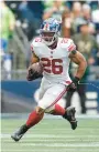  ?? MARCIO JOSE SANCHEZ/AP ?? Giants running back Saquon Barkley is heading into Sunday’s game at MetLife Stadium against the Houston Texans as the NFL’s third leading rusher this season with 779 yards.