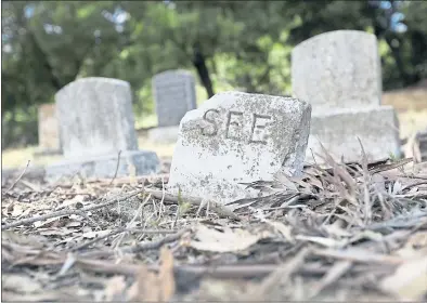  ?? PHOTOS BY LAURA A. ODA — STAFF PHOTOGRAPH­ER ?? Many gravestone­s are broken or tilting at the Mare Island Naval Cemetery in Vallejo, the first West Coast military cemetery.