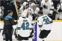  ?? MARK ZALESKI/ASSOCIATED PRESS ?? The Sharks’ Logan Couture (39) skated off the ice in a hurry in the second period after he was struck in the face by a deflected puck.