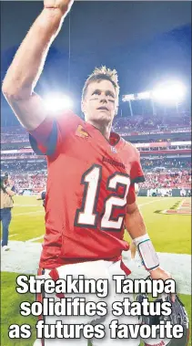  ?? Getty Images ?? STAYING POWER: Tom Brady and the defending champion Buccaneers are past their midseason slump and are Super Bowl favorites at +425 with BetMGM.