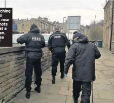  ??  ?? Police searching the scene in Moldgreen, near to where shots were fired at a group of men. Top, the area is taped off