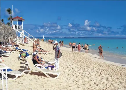  ?? SANDRA AND JOHN NOWLAN PHOTOS ?? Busy Bavaro Beach one of the finest stretches of fine, white sand and warm, clear water in the world.