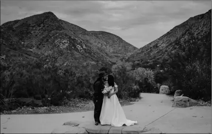  ?? Photograph­y via AP
Kristen Pritchard ?? In this 2020 photo provided by Kristen Pritchard Photograph­y, Kayleigh and Cody Cousins pose for wedding photos at Mission Trails Regional Park in San Diego, Calif.