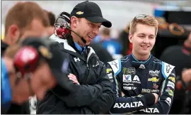 ?? SEAN GARDNER — GETTY IMAGES ?? Hendrick Motorsport­s driver William Byron, right, claimed the pole for the Daytona 500.