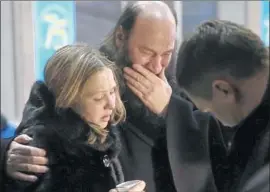  ?? Orsk.ru ?? DISTRAUGHT family and friends of passengers on the crashed Saratov Airlines f light gather at an airport in Orsk, Russia, the airliner’s intended destinatio­n.