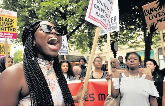  ?? RICHARD SWINGLER ?? Protesters voice their feelings in Queen Street, Cardiff, against black American lives being lost