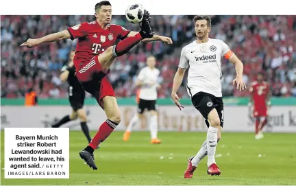  ?? / GETTY IMAGES/LARS BARON ?? Bayern Munich striker Robert Lewandowsk­i had wanted to leave, his agent said.