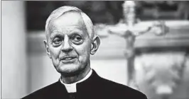  ?? SUSAN WALSH/AP 2015 ?? Cardinal Donald Wuerl was cited in a report as having allowed priests accused of sexual misconduct to be reassigned or reinstated. A clergyman has called on Wuerl to resign.