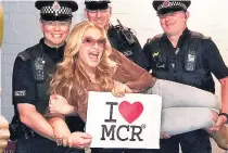  ??  ?? STAR SUPPORT Kym Marsh and, above, Anastacia with officers