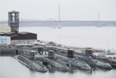  ?? PICTURE: JANE BARLOW/PA ?? 0 Seven of the decommissi­oned nuclear submarines are currently moored at Rosyth dockyard