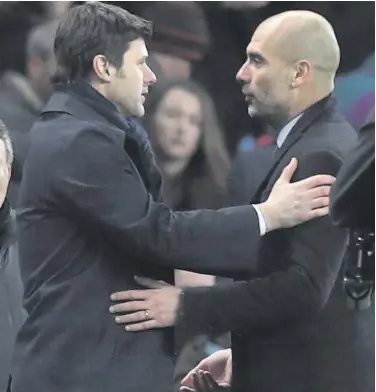  ??  ?? Good pals: Tottenham boss Mauricio Pochettino with Manchester City manager Pep Guardiola