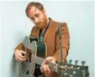  ?? — AP ?? In this May 15, 2017 photo, Dan Auerbach poses for a portrait in New York to promote his solo album, "Waiting On a Song."