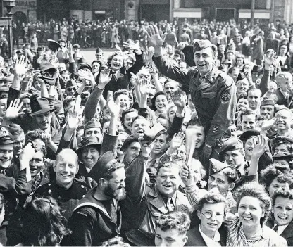  ?? Picture: Shuttersto­ck. ?? Jubilant crowds at Piccadilly Circus in London on VJ Day in August 1945.