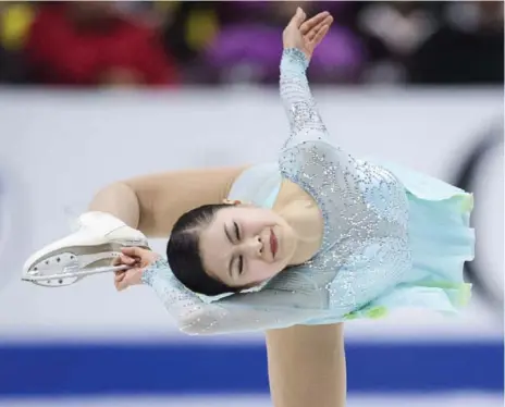  ?? FRANK GUNN/THE CANADIAN PRESS ?? Japan’s Satoko Miyahara was fifth in the women’s short program on Friday with 65.24 points, just ahead of Canada’s Alaine Chartrand, at 62.15.