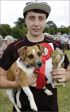  ??  ?? Brandon Kelly with the Best Terrier, Ruby.