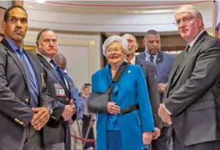  ?? AP PHOTO/VASHA HUNT ?? Gov. Kay Ivey, center, is introduced and invited into the chamber to give the State of the State Address to a joint session of the Alabama Legislatur­e last week in the old house chamber of the Alabama State Capitol in Montgomery, Ala.