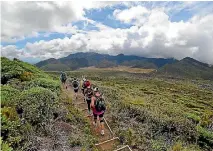  ?? NASA ?? The 19-kilometre Pouakai Crossing is set to attract thousands of walkers a year due to a plug by Lonely Planet.