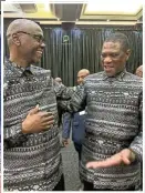  ?? ?? Above, presidenti­al spokespers­on Vincent Magwenya, left, and Deputy President Paul Mashatile wearing Madiba shirts.