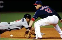  ?? ASSOCIATED PRESS ?? Twins’ Darin Mastroiann­i dives back toward second base as Indians shortstop Asdrubal Cabrera takes the throw in the eighth inning on Tuesday in Cleveland.