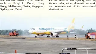  ?? ?? Cebu Pacific Flight 5J 404 is welcomed with a water cannon salute upon landing at Laoag Internatio­nal Airport