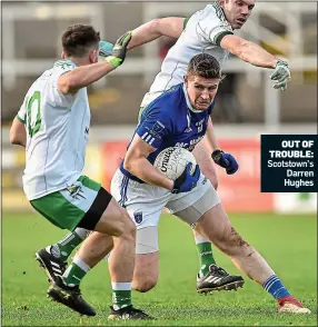  ??  ?? OUT OF TROUBLE: Scotstown’s Darren Hughes