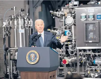  ?? MILLS/THE NEW YORK TIMES DOUG ?? President Joe Biden visits a Pfizer COVID-19 vaccine manufactur­ing site Feb. 19 near Portage, Michigan.