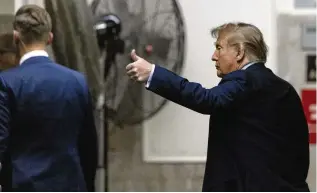  ?? JEENAH MOON/POOL PHOTO VIA AP ?? Former President Donald Trump exits the courtroom during a break at Manhattan criminal court before his trial in New York, Friday.