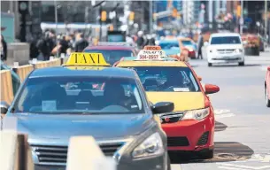  ?? RENÉ JOHNSTON TORONTO STAR FILE PHOTO ?? “The economy has come to a standstill,” said Abdul-Kadir Mohamoud, CEO of Co-op Cabs. “We’re all suffering.” Mohamoud said business is down about 10 to 20 per cent from normal.