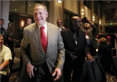 ?? BRYNN ANDERSON — THE ASSOCIATED PRESS FILE ?? FILE- In this file photo, U.S. Senate candidate Roy Moore greets supporters before his election party in Montgomery, Ala. President Donald Trump’s former chief strategist Steve Bannon is boosting multiple challenger­s to GOP incumbents and the party’s...