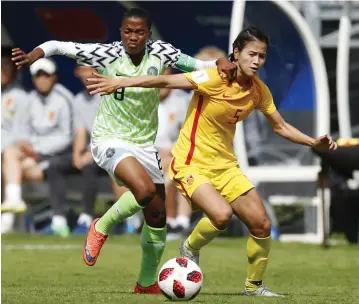  ?? Photo: AFP ?? Nigeria’s forward Rasheedat Ajibade (L) vies for the ball with China’s defender Qiaozhu Chen during the Women’s World Cup U-20 Group D match at the Clos Gastel stadium in Dinan, France yesterday