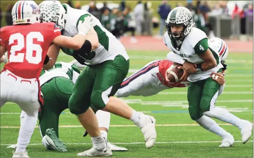  ?? Erik Trautmann / Hearst Connecticu­t Media ?? Norwalk takes on Brien McMahon during their annual Thanksgivi­ng Day intracity football game in 2019, at Brien McMahon in Norwalk.