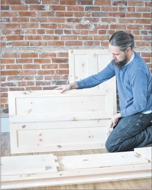  ?? SUBMITTED PHOTO ?? New Brunswick woodworker Jeremy Burrill assembles a casket.